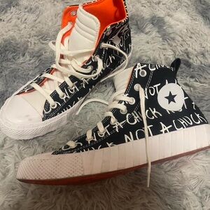 Converse Not A Chuck Black and White High-Top Sneakers with Orange Lining